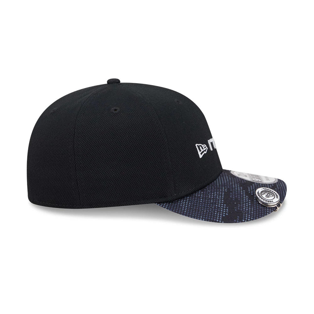 New Era Golf Black 9FIFTY Snapback Adjustable Cap, side view showing the embroidered New Era flag logo on the left side of the structured black crown, with a patterned dark visor and a 9FIFTY size sticker.