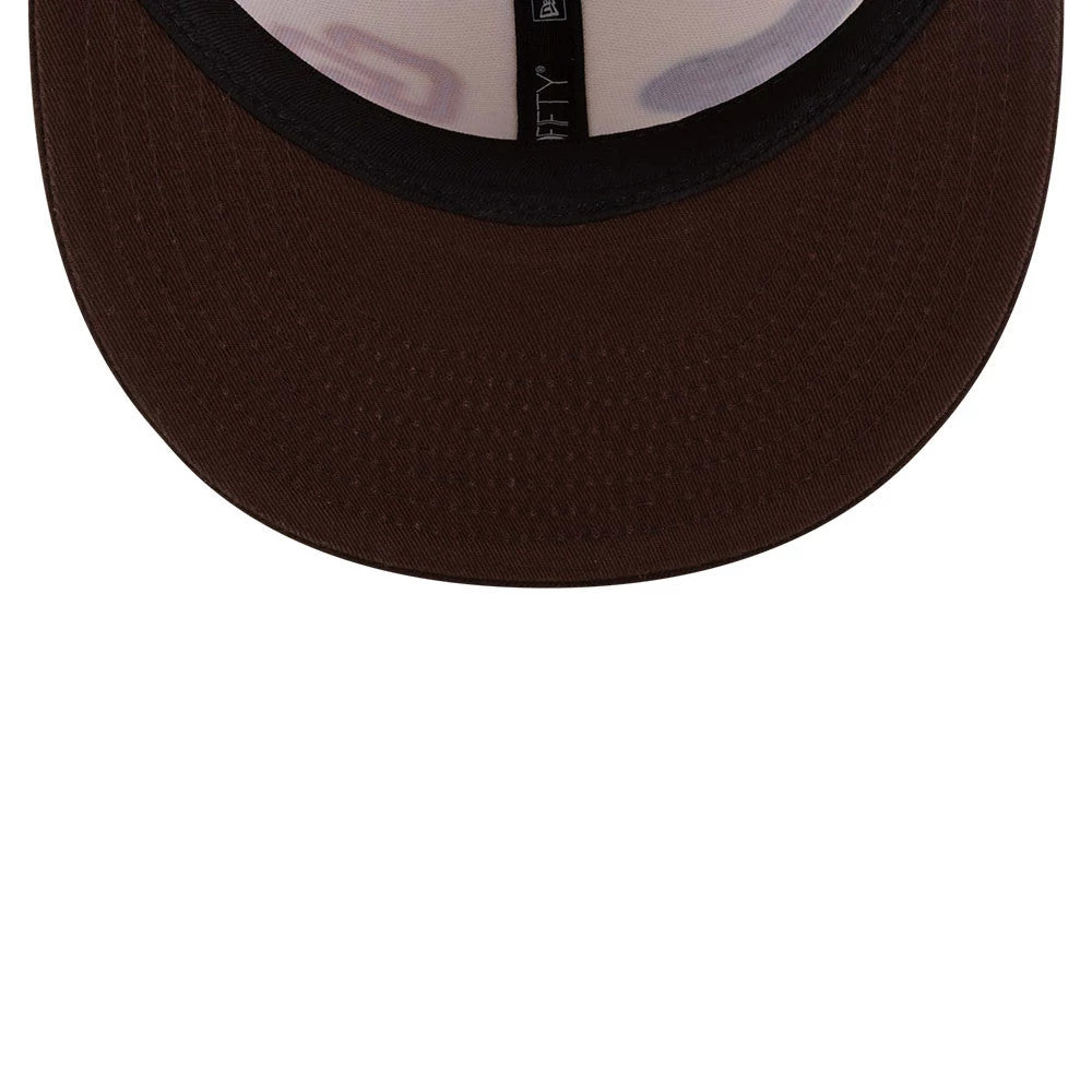 Dueling League MLB Mexico City Series 2026 White New Era 59FIFTY Fitted Cap, inside view showing a dark brown undervisor, black sweatband with brand taping, and part of the interior panelling, providing a glimpse of the cap's structure and design.
