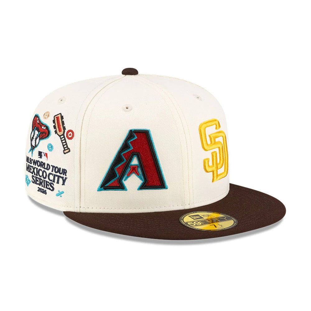 All Over MLB Mexico City Series 2026 White New Era 59FIFTY Fitted Cap, three-quarter view showing the embroidered red and teal A-team logo on the front panel, mustard yellow SD logo on the right panel.