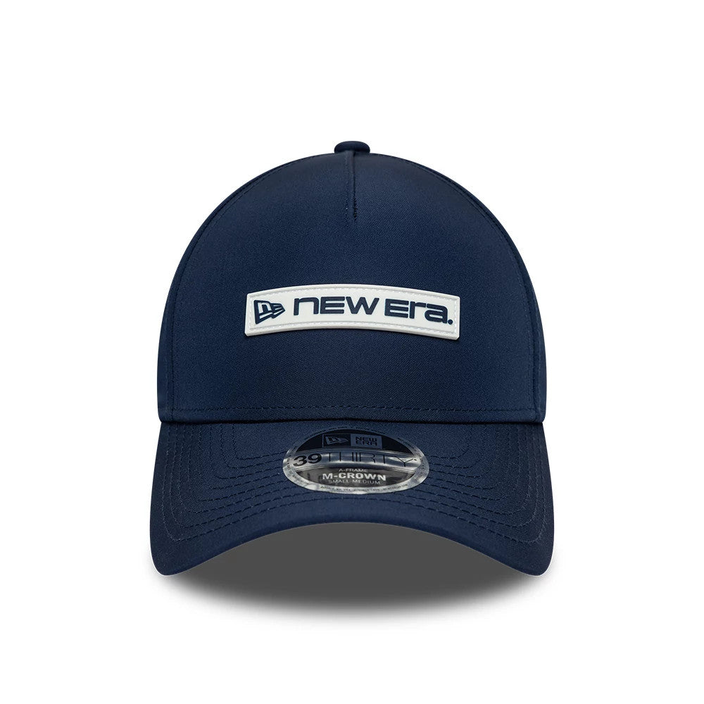New Era Rubber Patch Dark Blue New Era 39THIRTY M-Crown A-Frame Stretch Fit Cap, front view showing the white and navy New Era logo on the structured dark blue crown, with a curved visor and a 39THIRTY size sticker.