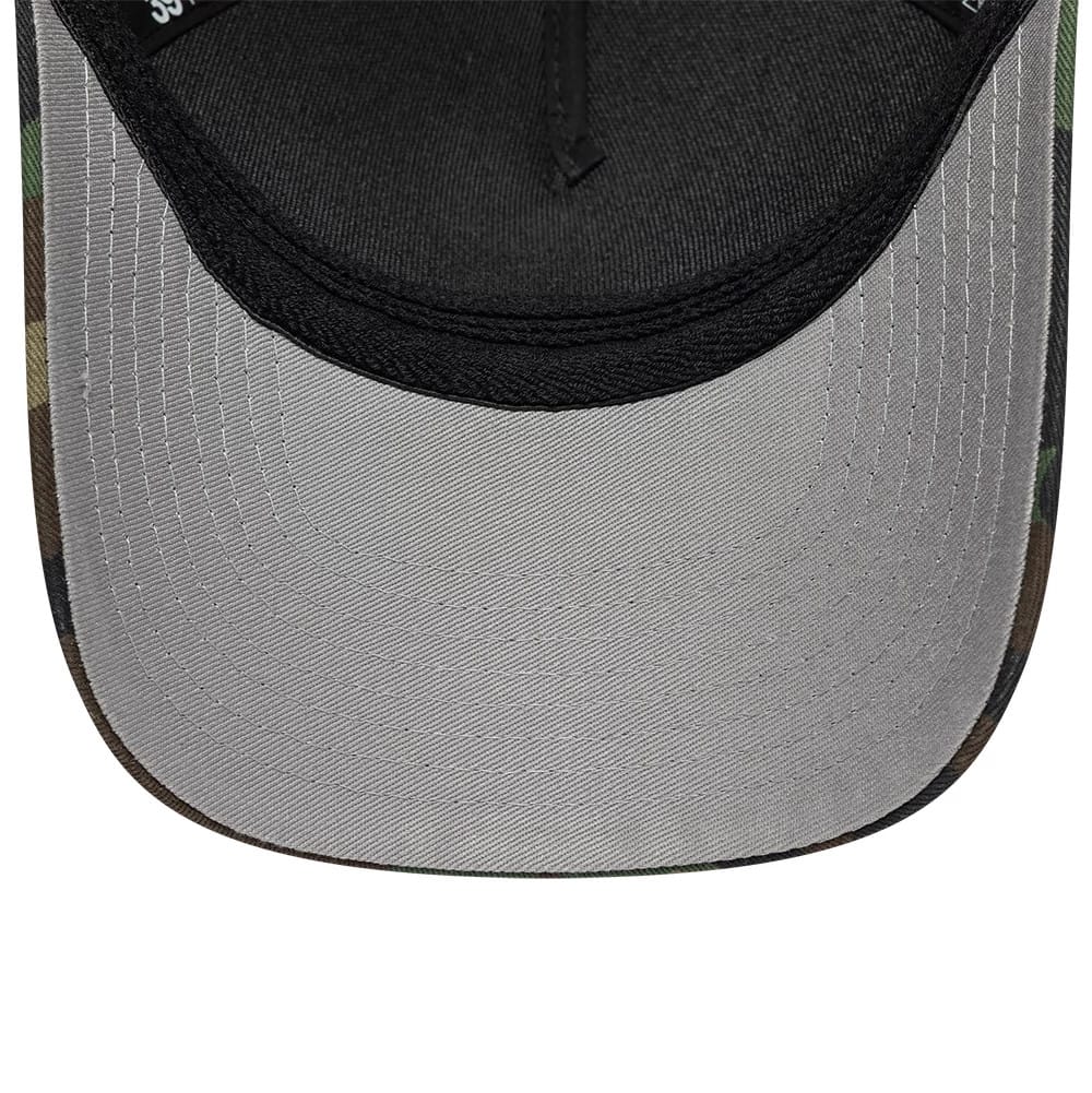 New Era Woodland Camo 39THIRTY M-Crown A-Frame Stretch Fit Cap, inside view showing the grey undervisor with detailed stitching, black edge of the visor, and dark inner crown fabric, highlighting the contrasting elements of the cap's interior design.