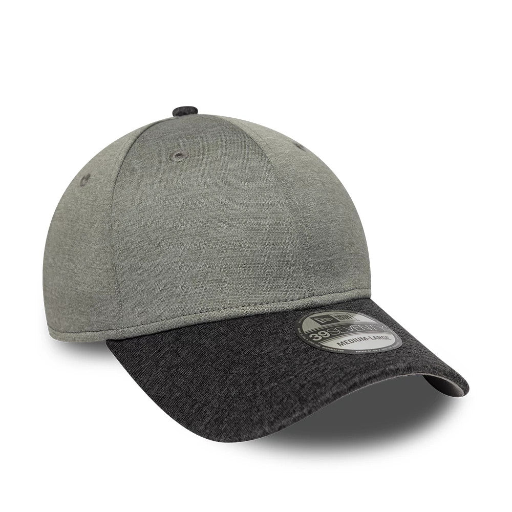 New Era 2 Tone Grey New Era 39SEVENTY Stretch Fit Cap, three-quarter view showing a light grey structured crown with matching eyelets and top button, contrasting with a dark grey curved visor featuring a 39SEVENTY size sticker.