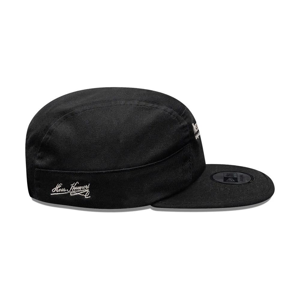 Pictured is this New Era X Hermanos Koumori Running Camper cap in black. 4