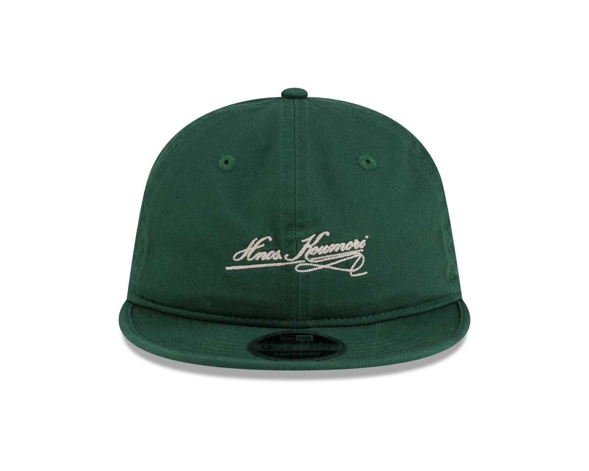 Pictured is this New Era X Hermanos Koumori Cursive Retro Crown 9FIFTY cap in green. 2