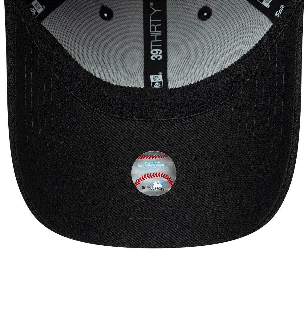 Chicago White Sox MLB Classic Black New Era 39THIRTY Stretch Fit Cap, inside view showing the grey sweatband with black stitching, black taping with white 39THIRTY branding, and a baseball-shaped sticker placed on the black undervisor.