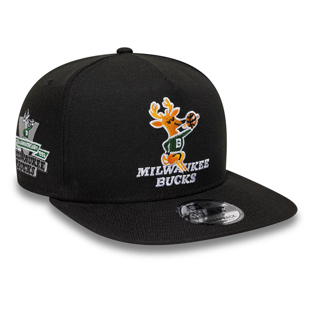 Bucks NBA Hardwood Classic Black New Era 9FIFTY A-Frame Snapback Adjustable Cap, three-quarter view showing the raised embroidered Milwaukee Bucks logo with a basketball on the front panel, a 9FIFTY size sticker on the black visor.