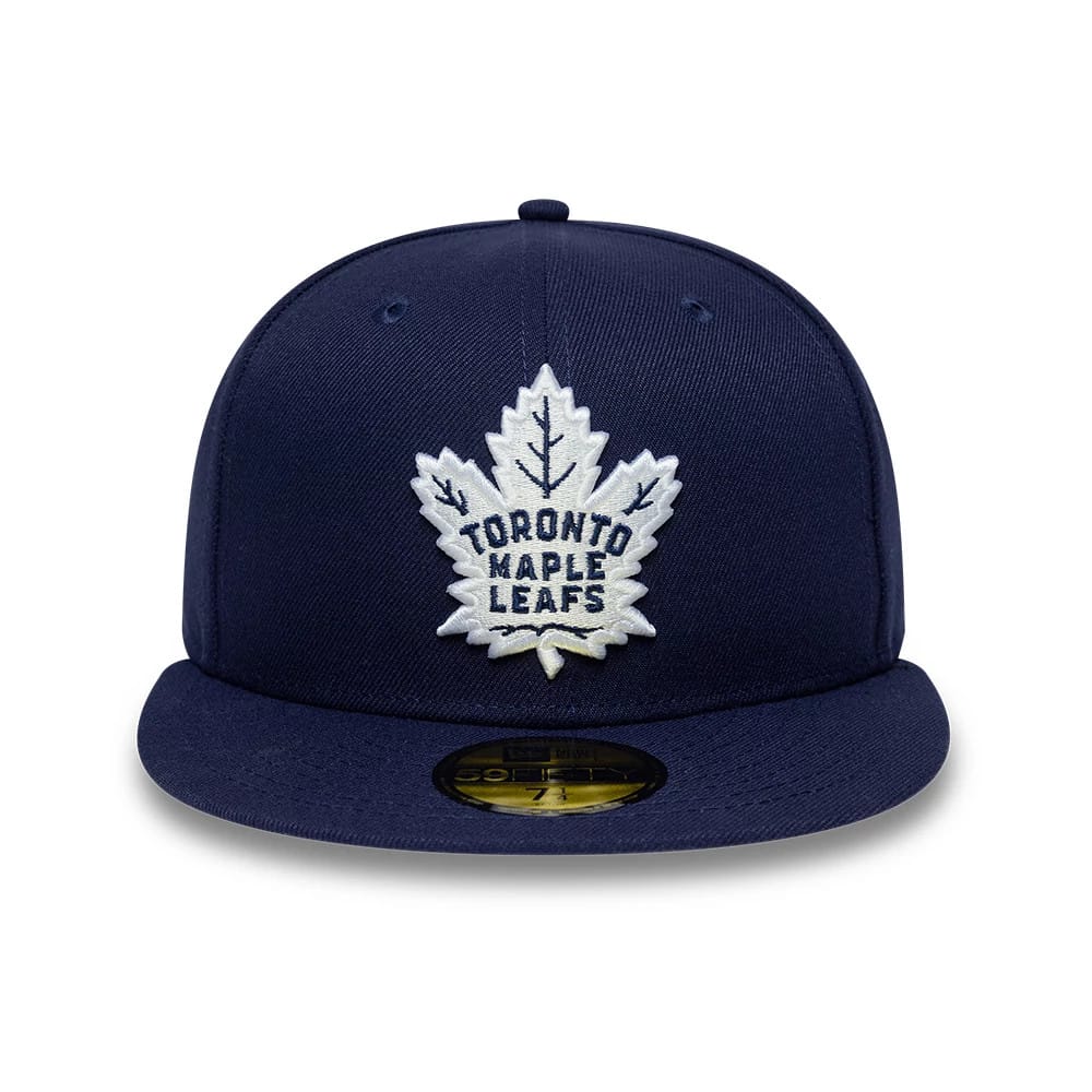 Pictured is this NHL Basic Toronto Maple Leafs 59FIFTY Fitted cap in navy. 3