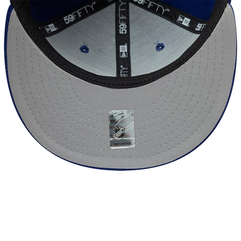 Tampa Bay Lightning NHL Basic Dark Blue New Era 59FIFTY Fitted Cap, inside view showing the grey undervisor with an NHL holographic sticker, black sweatband, and black 59FIFTY taping along the seams under the structured crown.