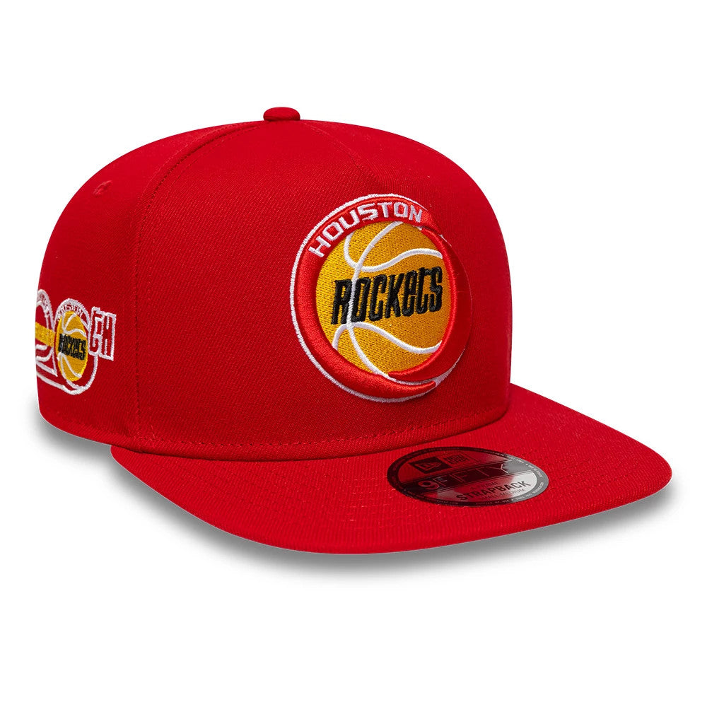 Houston Rockets NBA Hardwood Classic Red New Era 9FIFTY A-Frame Snapback Adjustable Cap, three-quarter view showing a large embroidered Rockets basketball logo on the front panel, a flat red visor with a 9FIFTY size sticker.