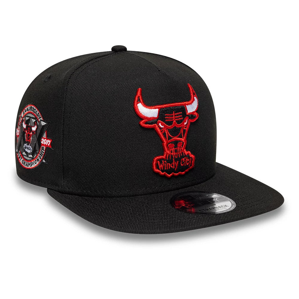 Chicago Bulls NBA Hardwood Classic Black New Era 9FIFTY A-Frame Snapback Adjustable Cap, three-quarter view showing the raised red Chicago Bulls logo embroidered on the front panel, black flat visor with 9FIFTY size sticker, and detailed side patch.
