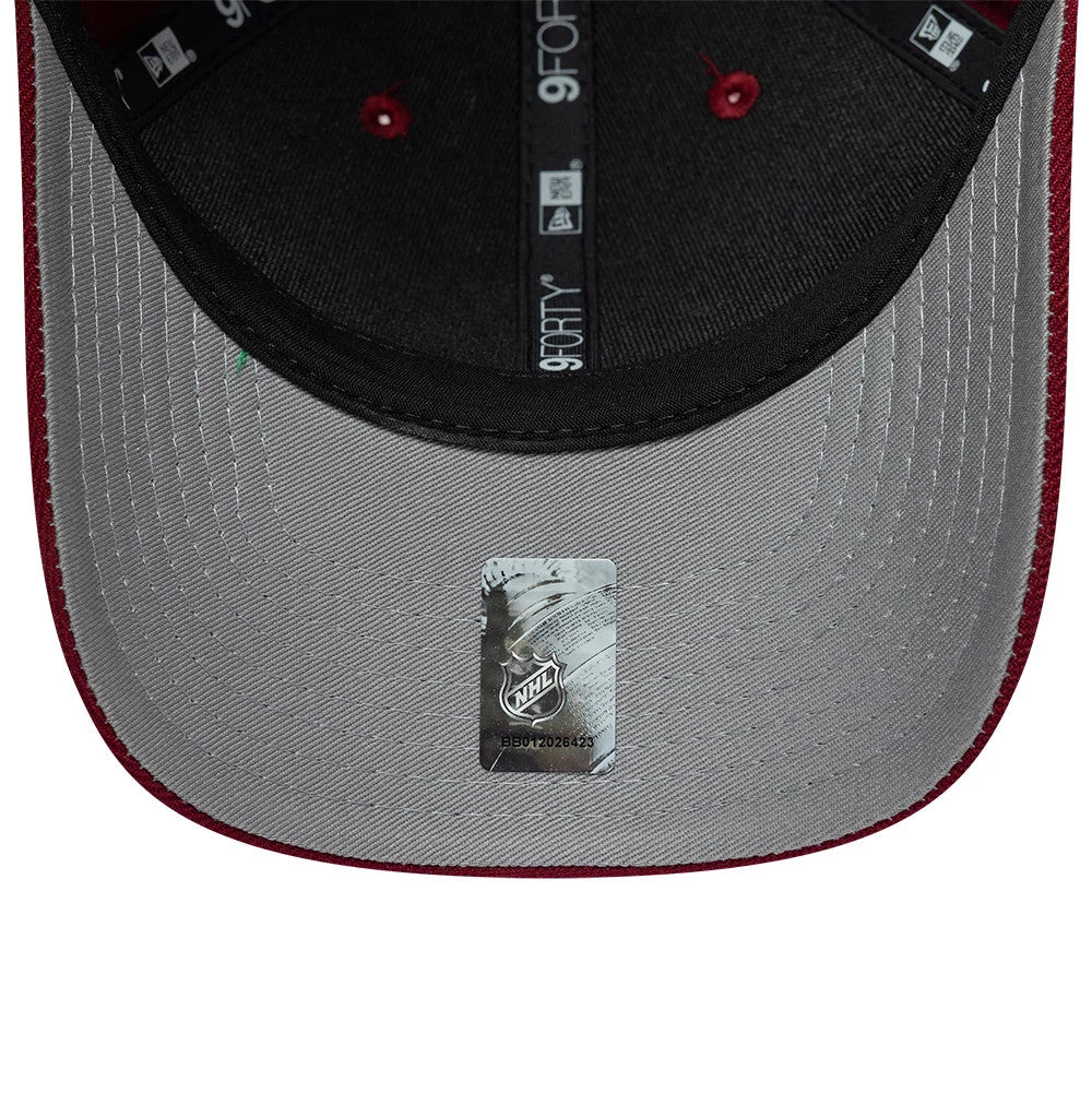Colorado Avalanche NHL Team Dark Red New Era 9FORTY M-Crown Adjustable Cap, inside view showing grey undervisor, black sweatband with New Era and 9FORTY branding, and NHL sticker at centre of the grey fabric.