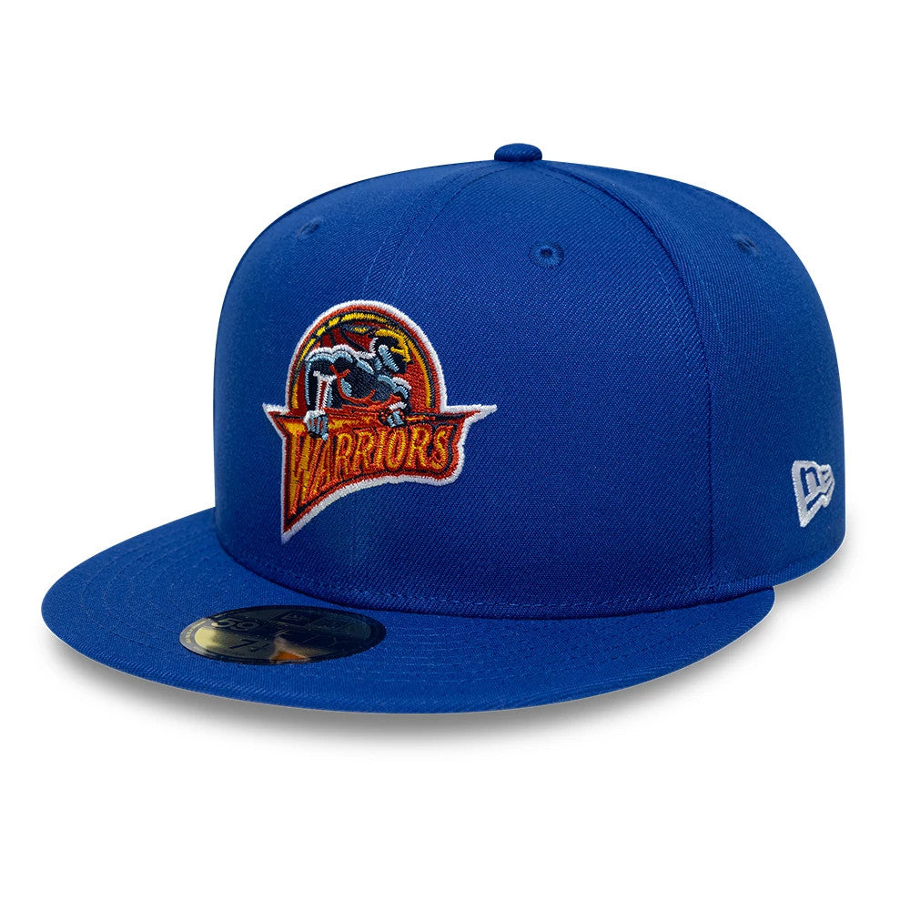 Golden State Warriors NBA Hardwood Classic Blue New Era 59FIFTY Fitted Cap, front view showing the raised embroidered logo in red, orange, and white on the structured blue crown, with a black 59FIFTY size sticker on the flat blue visor.