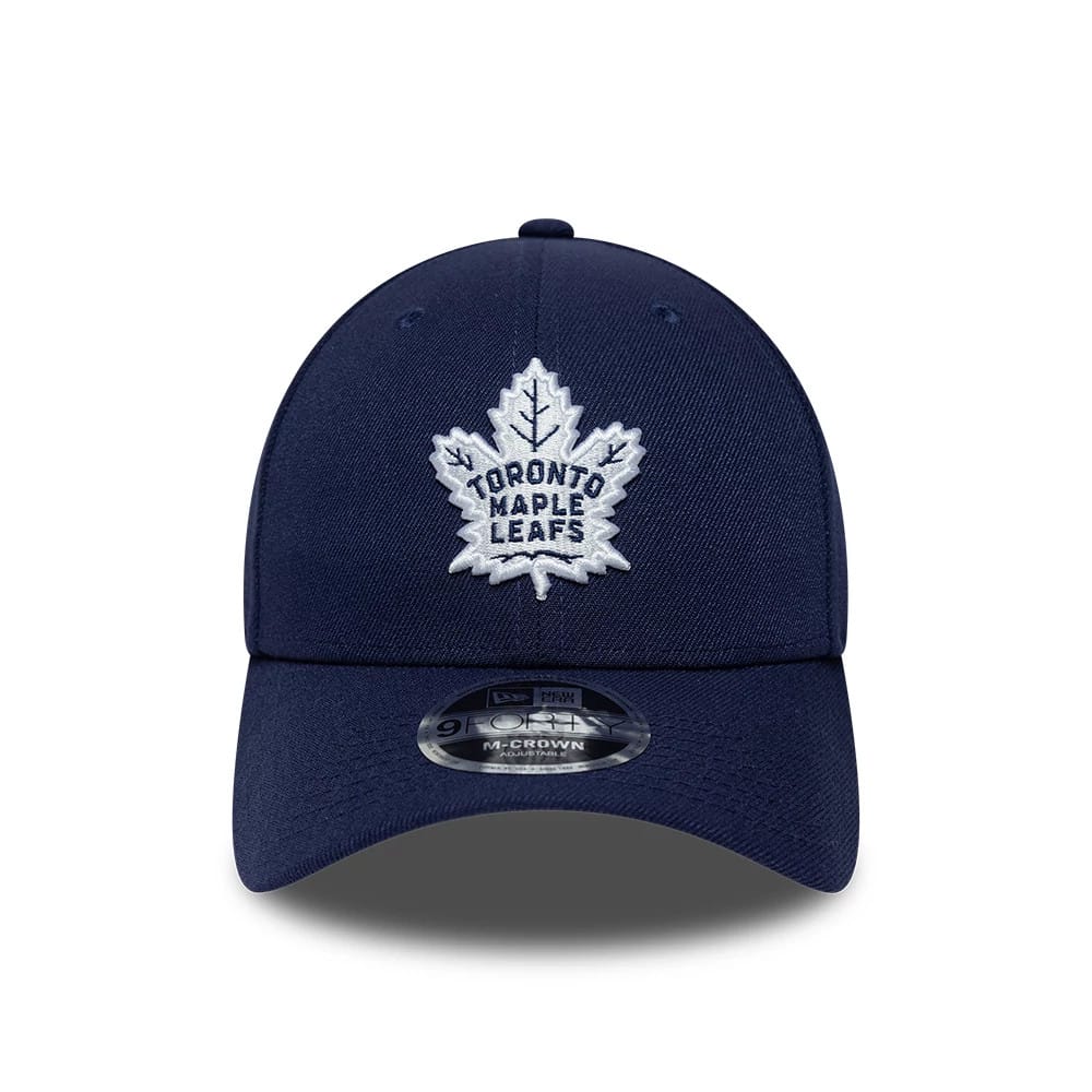 Pictured is this NHL Team Toronto Maple Leafs 9FORTY M-Crown cap in navy. 3