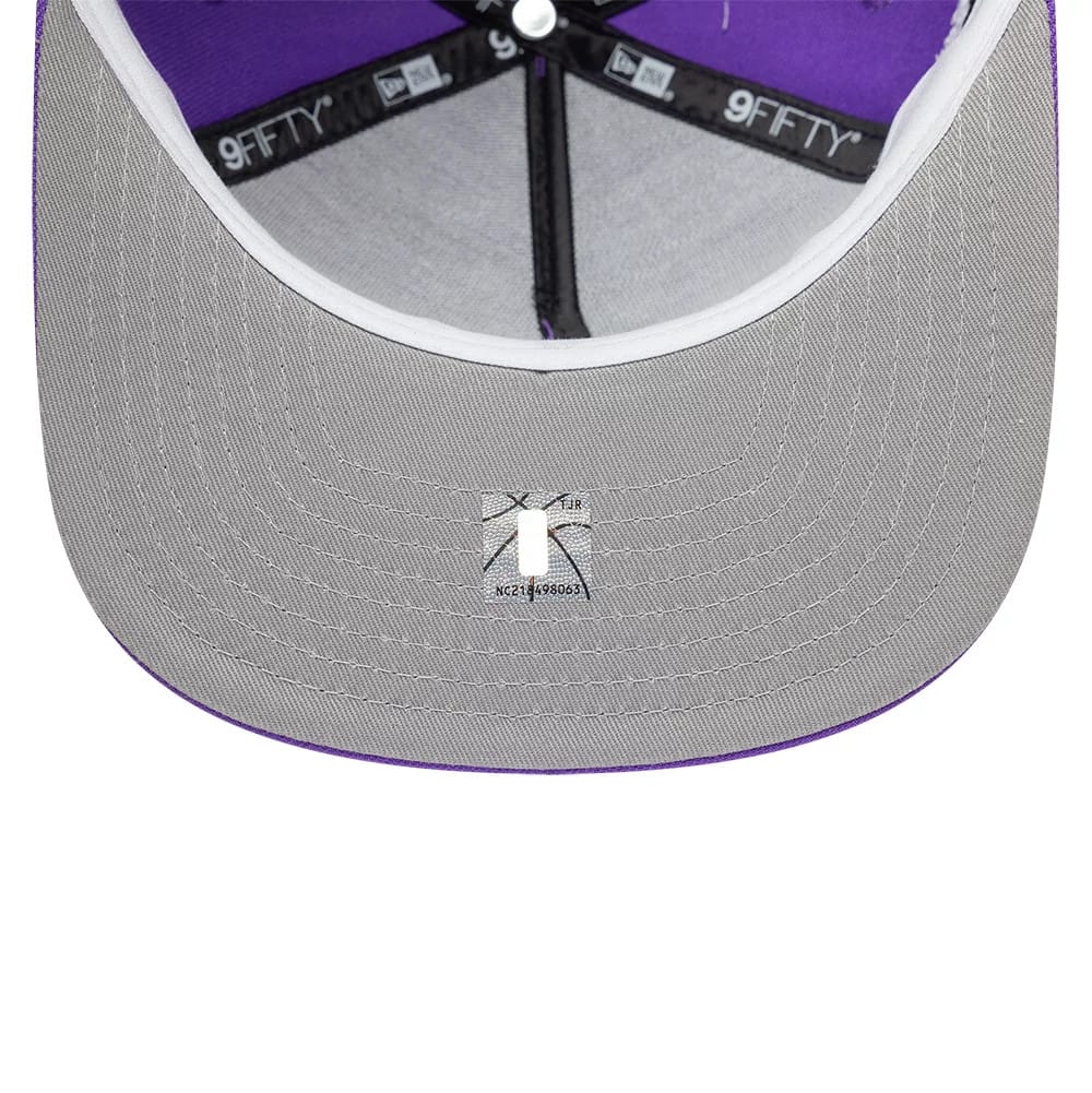 Pictured is this NBA Hardwood Classic Toronto Raptors 9FIFTY A-Frame Snapback cap in bright purple. 2
