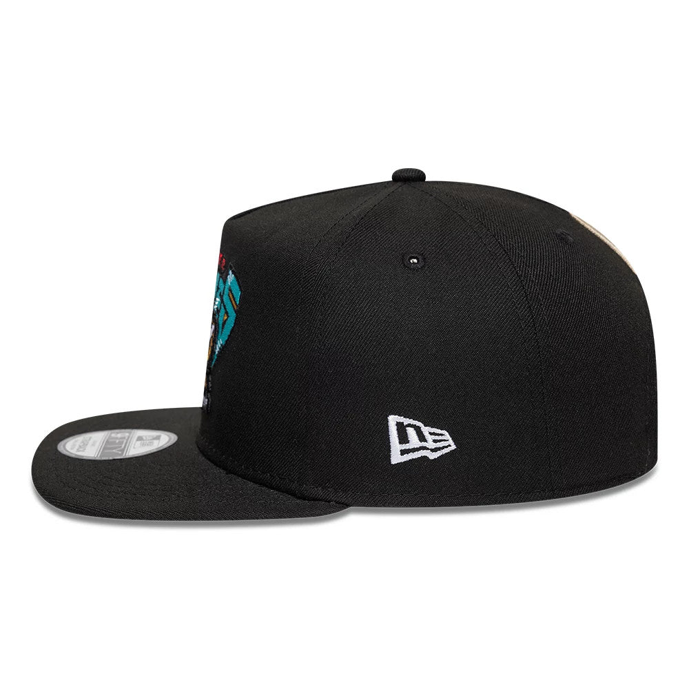 Vancouver Grizzlies NBA Hardwood Classic Black New Era 9FIFTY A-Frame Snapback Adjustable Cap, side view showing the white New Era flag logo on the left side of the structured black crown, with a flat visor and attached 9FIFTY size sticker.