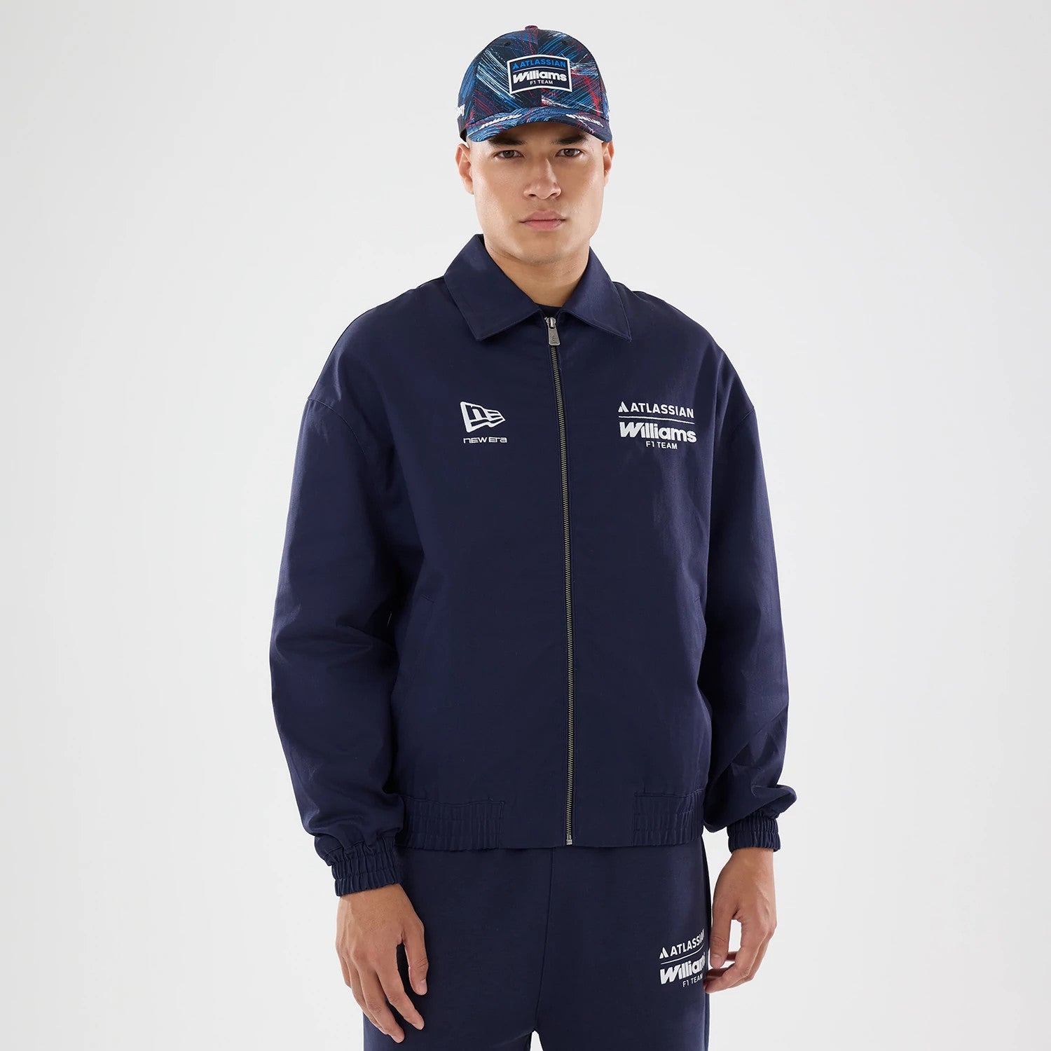 The model is wearing this Williams GB Race Special Collared Jacket in navy. 1