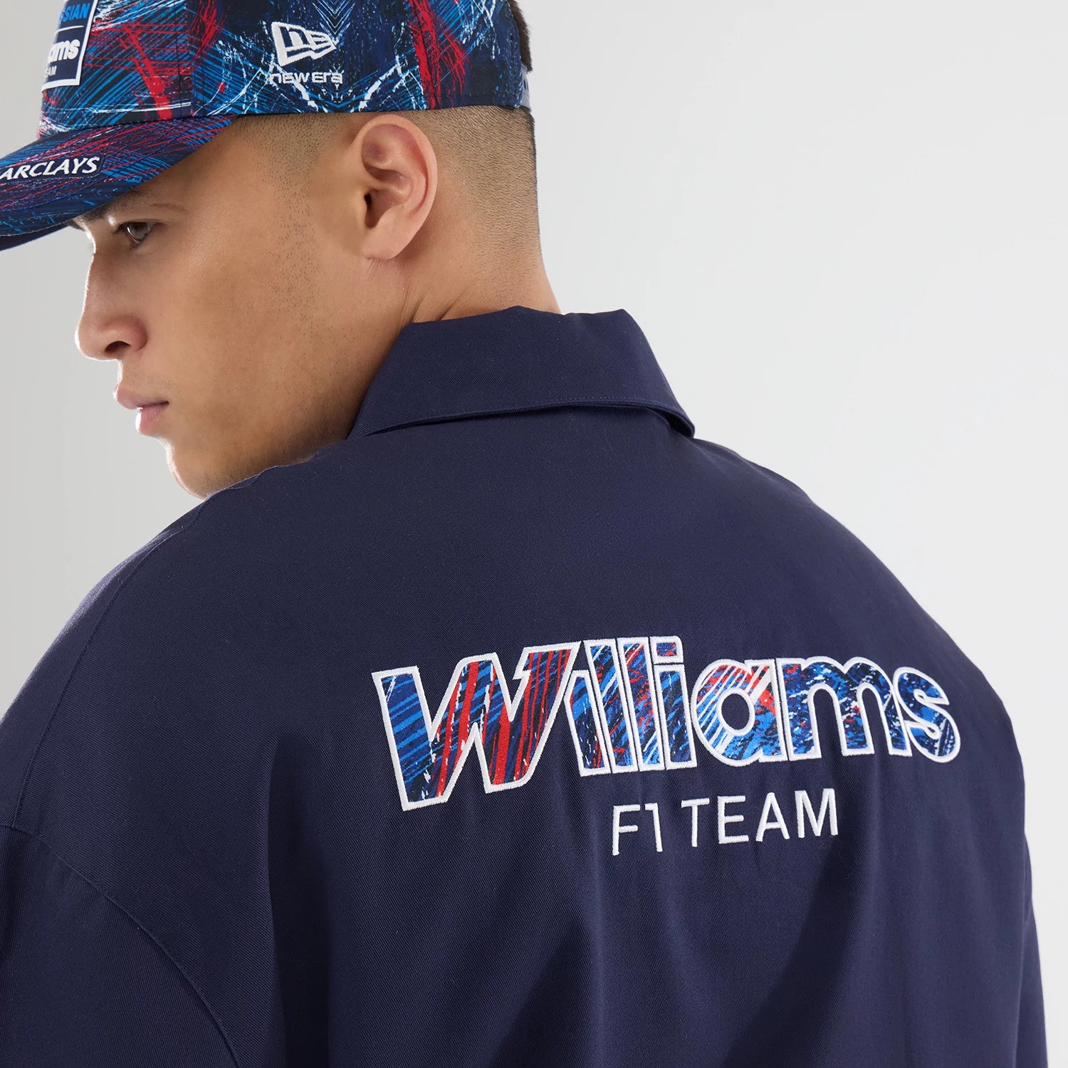 The model is wearing this Williams GB Race Special Collared Jacket in navy. 4