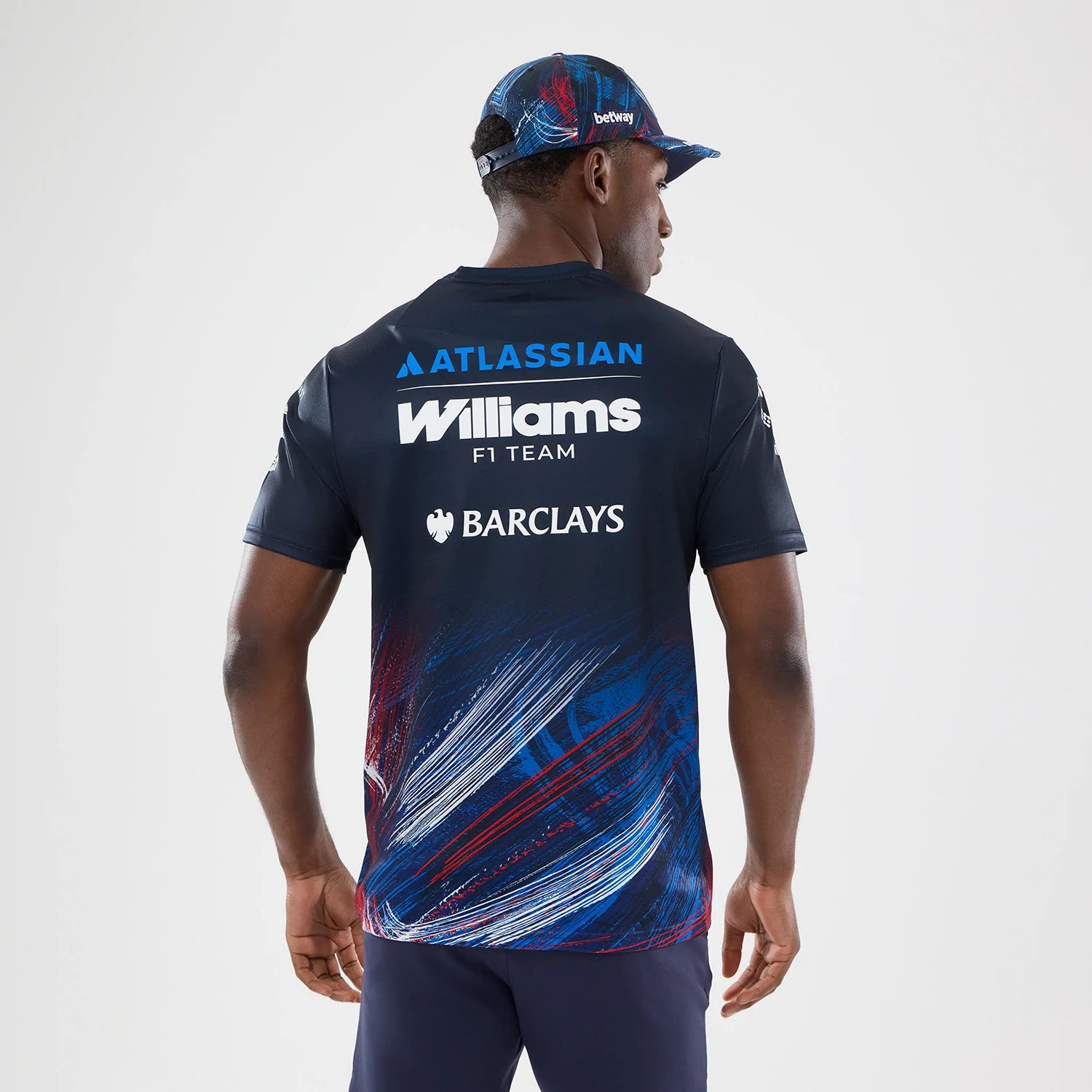The model is wearing this Williams GB Race Special Tech T-Shirt in navy. 2