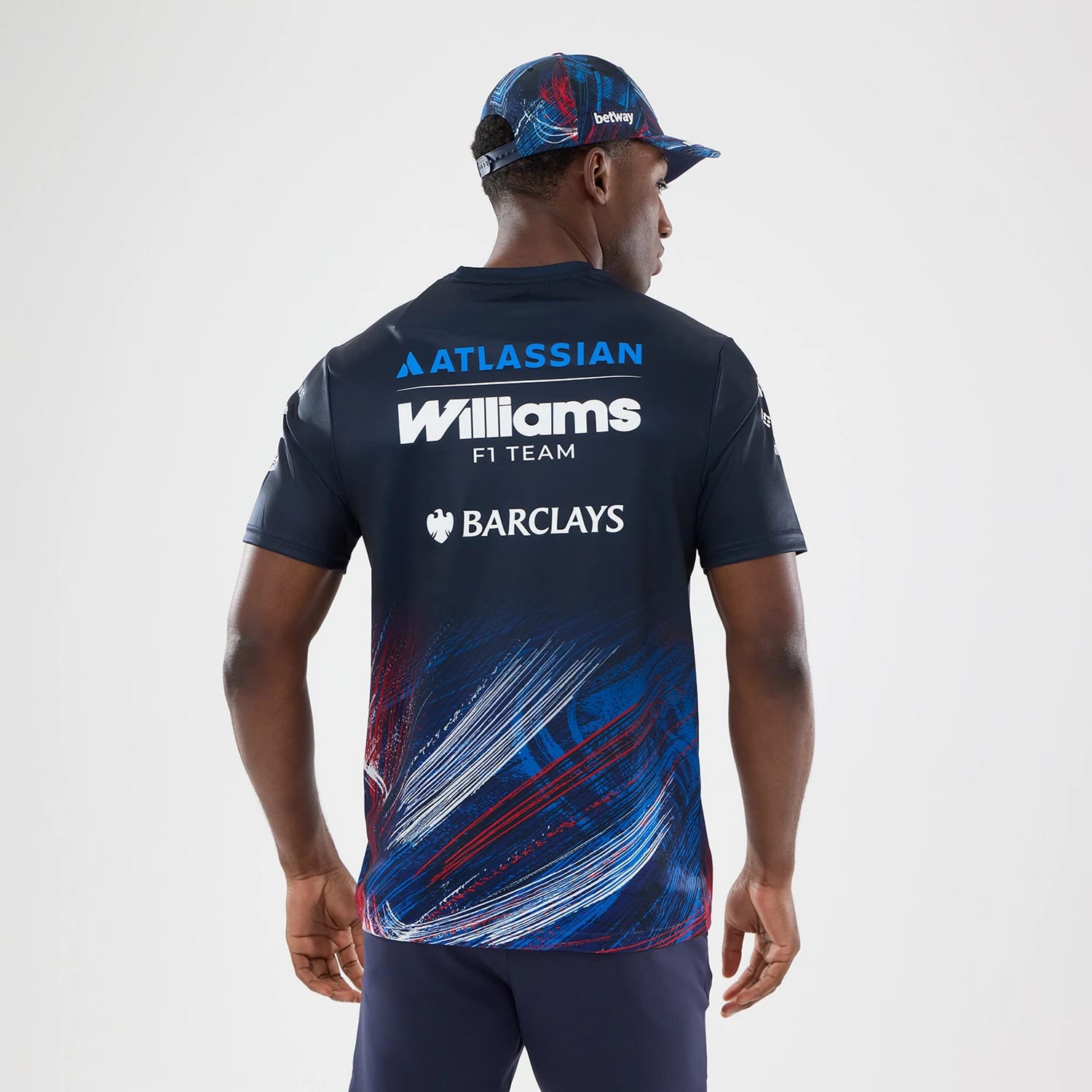 The model is wearing this Williams GB Race Special Tech T-Shirt in navy. 2