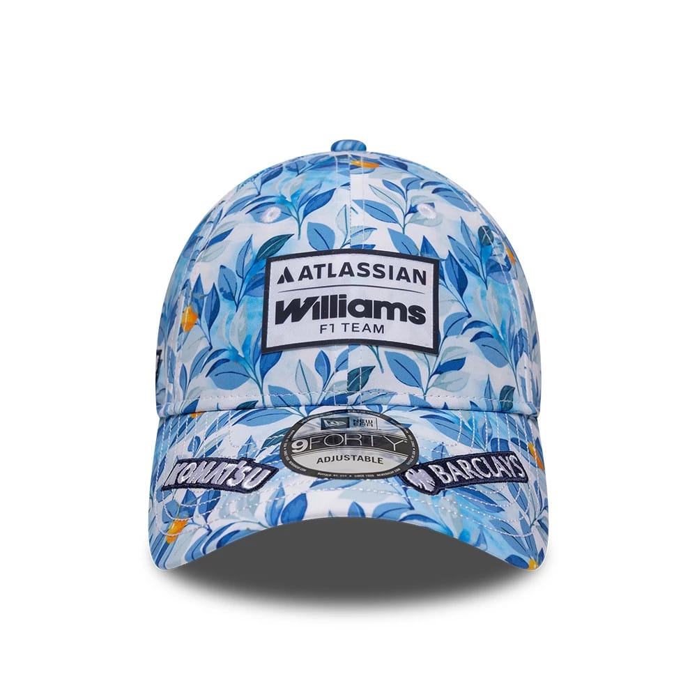 Williams Barcelona Race Special Multi New Era 9FORTY Adjustable Cap, front view showing the embroidered Atlassian Williams F1 Team logo on the floral patterned crown, with a 9FORTY size sticker on the colourful visor.