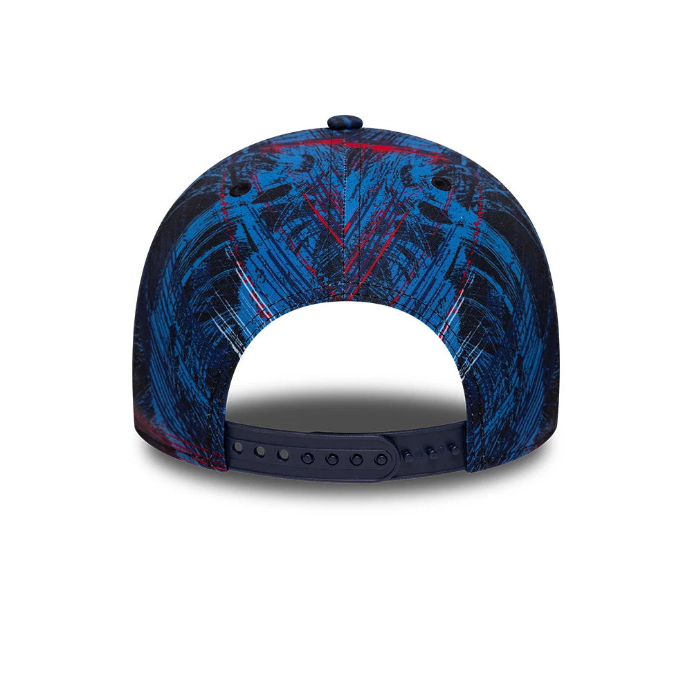 Williams GB Race Special Navy New Era 9FORTY M-Crown Adjustable Cap, rear view showing a abstract pattern in blue and red across the structured crown, with a navy adjustable strap featuring multiple holes for a custom fit.