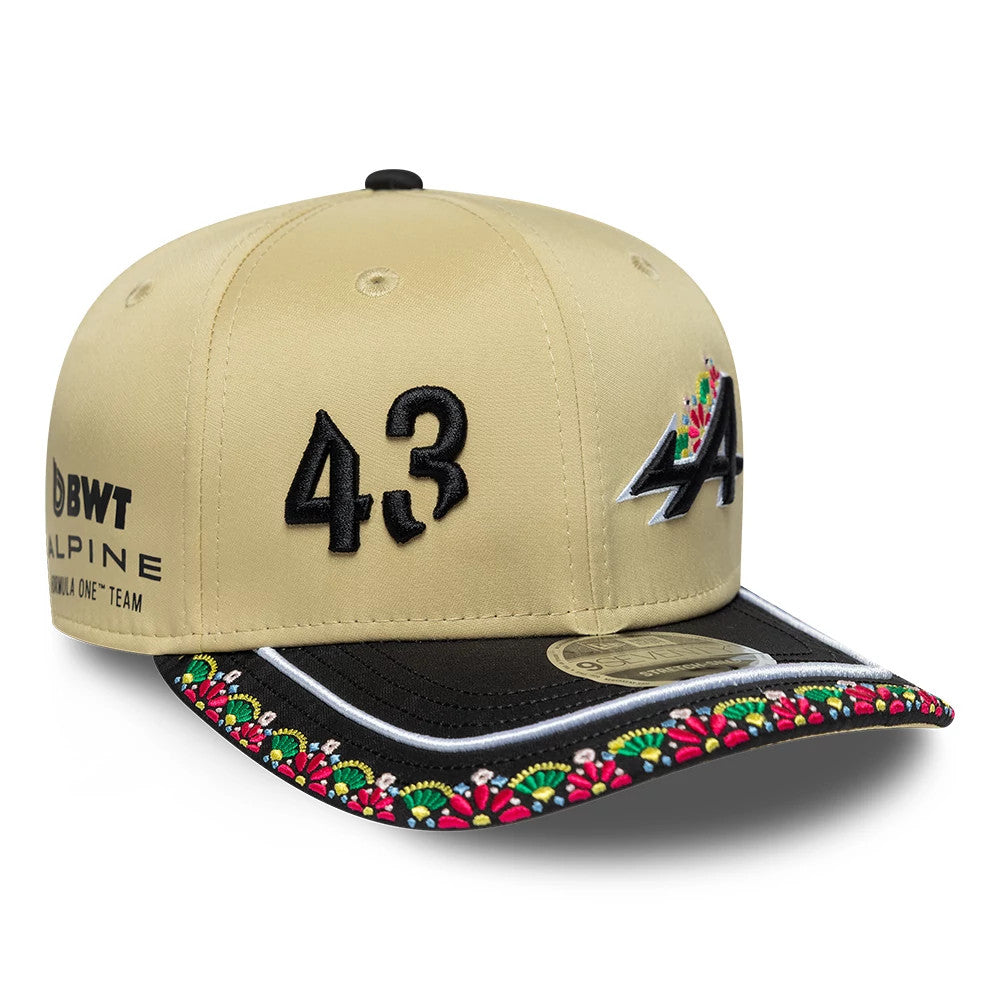 Alpine Racing Latin American Franco Colapinto Light Beige New Era 9SEVENTY Stretch Snap Adjustable Cap, front view showing the black embroidered number 43 on the beige structured crown, a multicoloured floral pattern on the black visor.