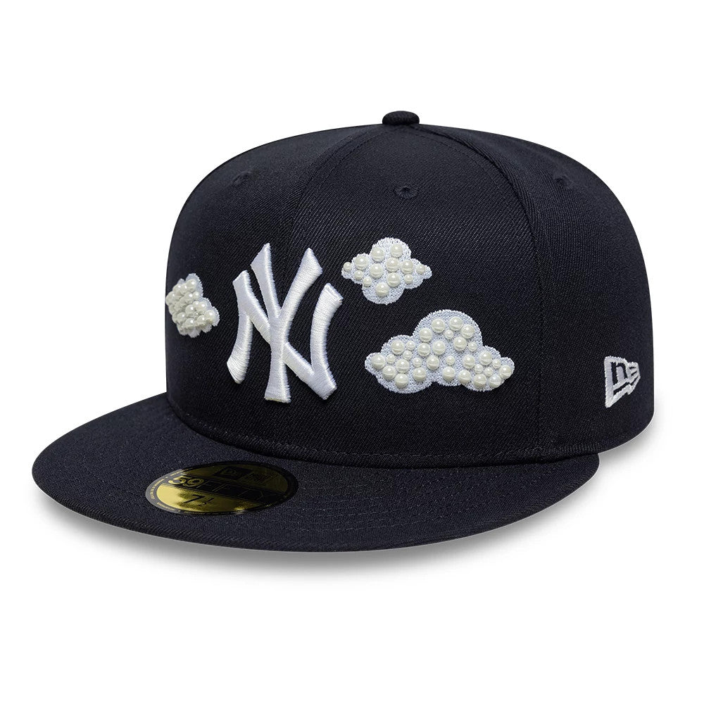 New York Yankees MLB Faux Pearl Cloud Navy New Era 59FIFTY Fitted Cap, front view showing the raised white NY logo with pearl-embellished cloud designs on the navy crown, alongside the New Era flag logo on the left side.