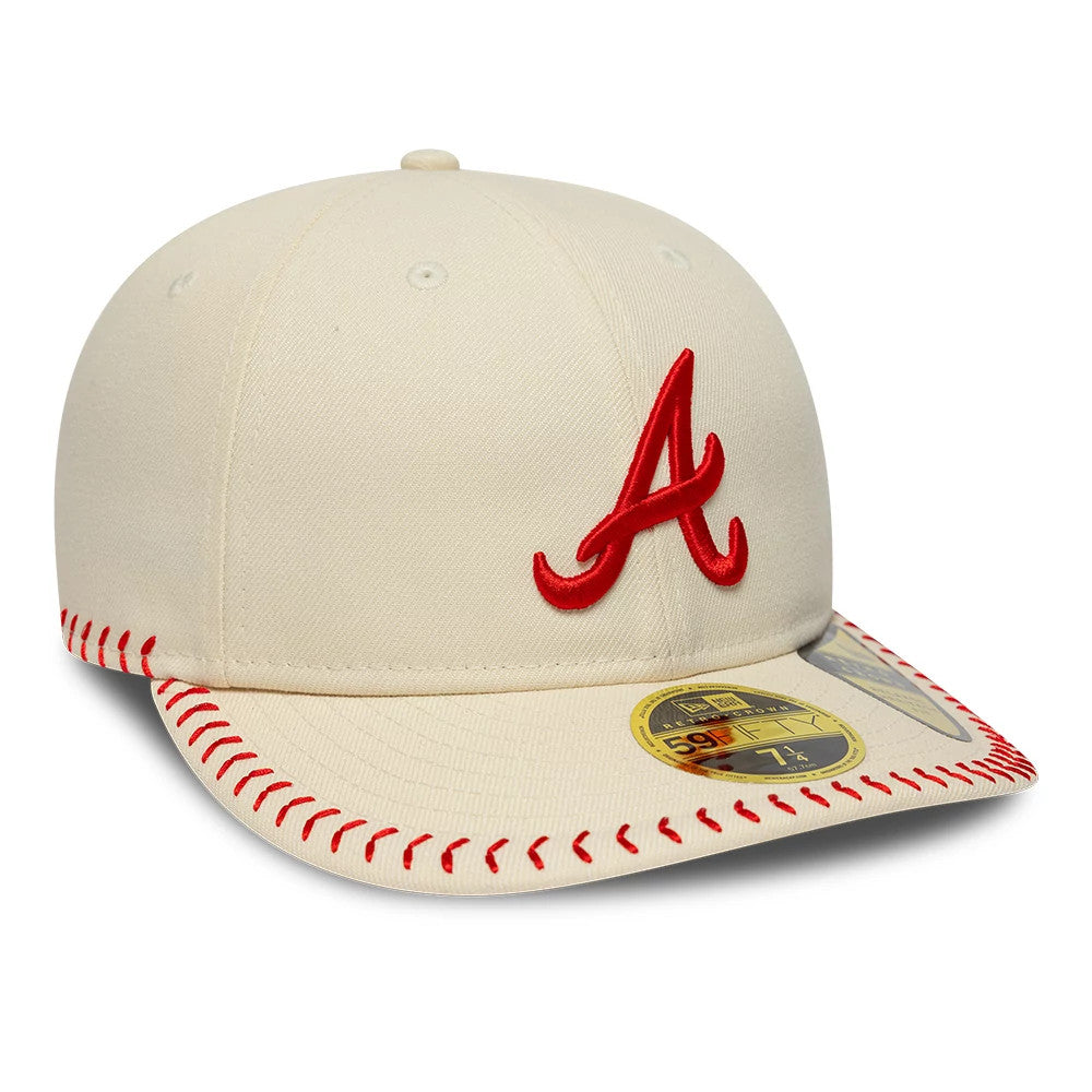 Atlanta Braves MLB Baseball Stitch Cream Retro Crown New Era 59FIFTY Fitted Cap, front view showing the red embroidered A logo on the cream front panel, featuring red baseball stitch on the visor and a gold 59FIFTY size sticker on top.