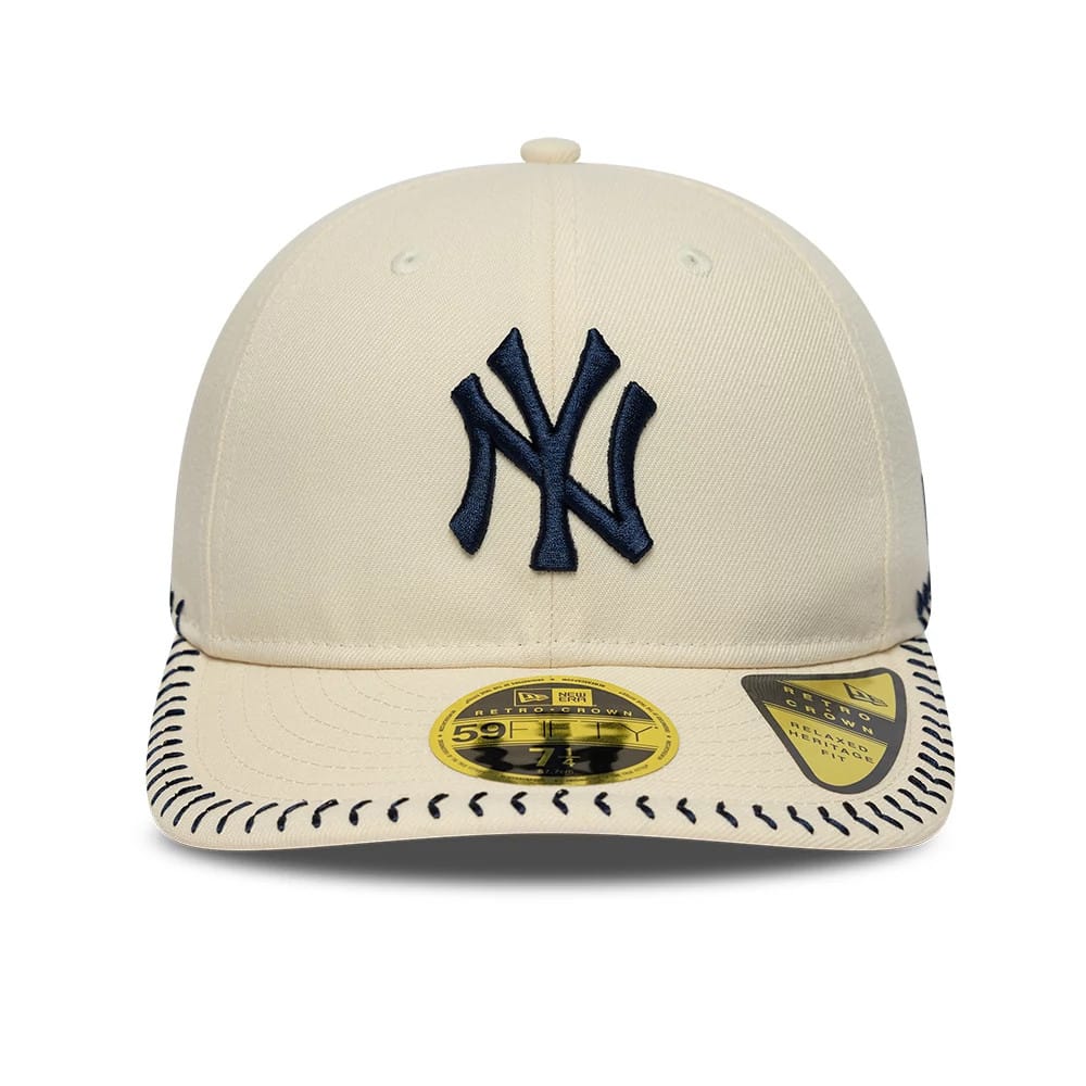 Pictured is this MLB Baseball Stitch New York Yankees Retro Crown 59FIFTY Fitted cap in Cream. 2