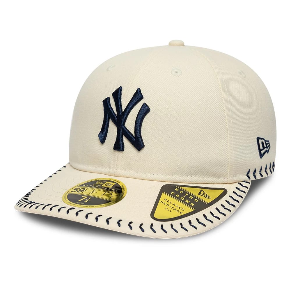 Pictured is this MLB Baseball Stitch New York Yankees Retro Crown 59FIFTY Fitted cap in Cream. 1