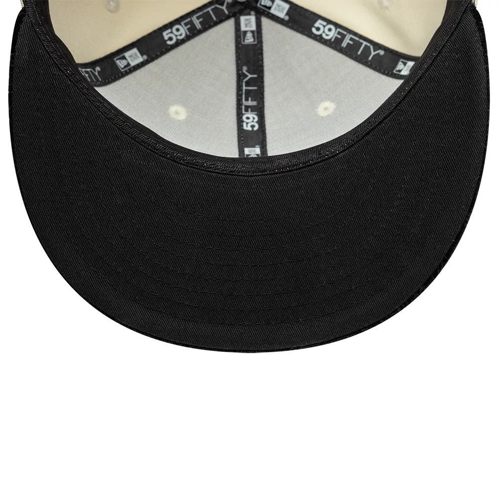 New Era Paisley Visor Light Beige 59FIFTY Fitted Cap, inside view showing the black 59FIFTY-branded taping and light beige sweatband encircling the structured grey interior, with a contrasting black undervisor adding depth to the design.
