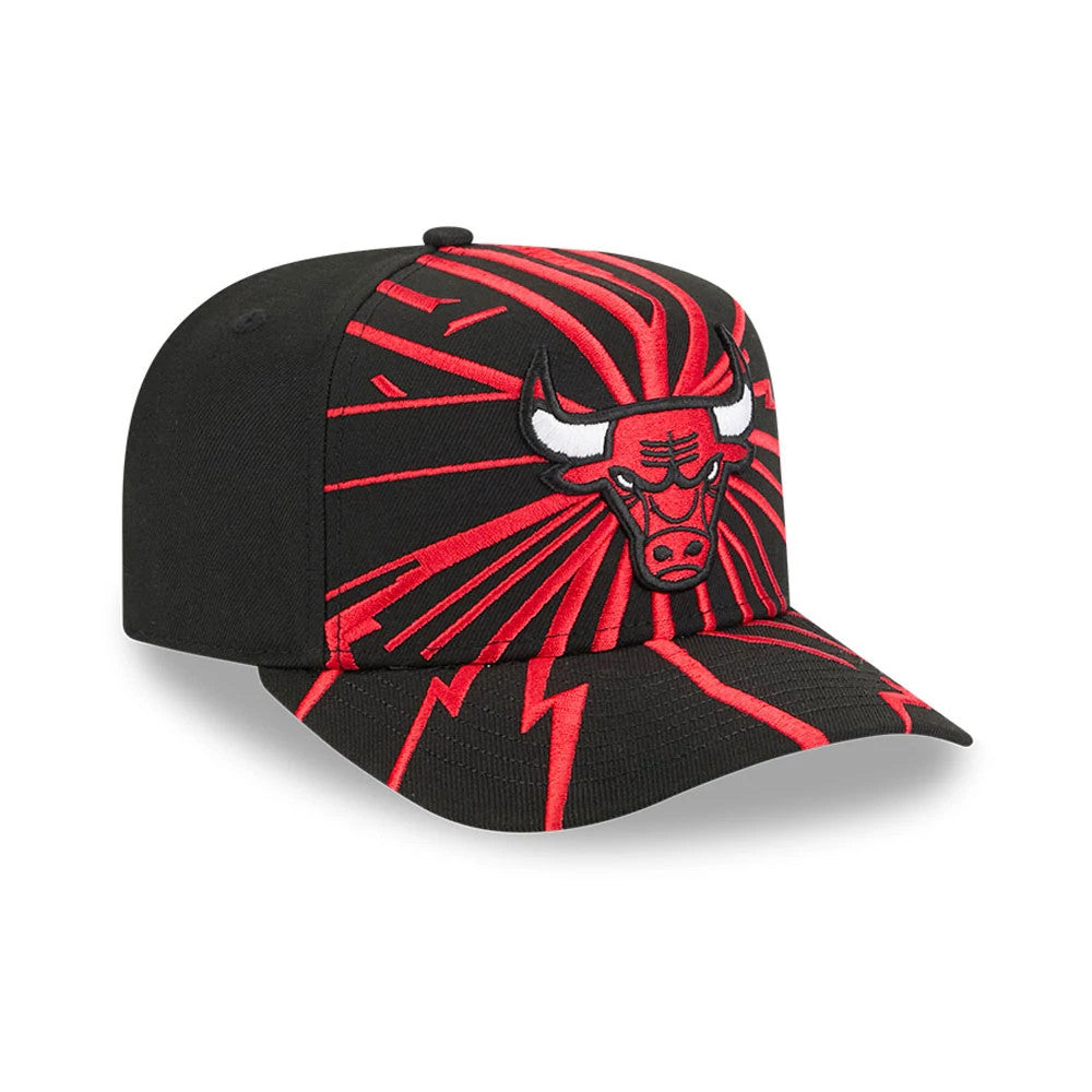 Chicago Bulls NBA Shattered Black New Era 9FORTY A-Frame Adjustable Cap, three-quarter view showing a red and black Chicago Bulls logo on the front panel, dynamic red shattered pattern across the structured black crown and curved visor.