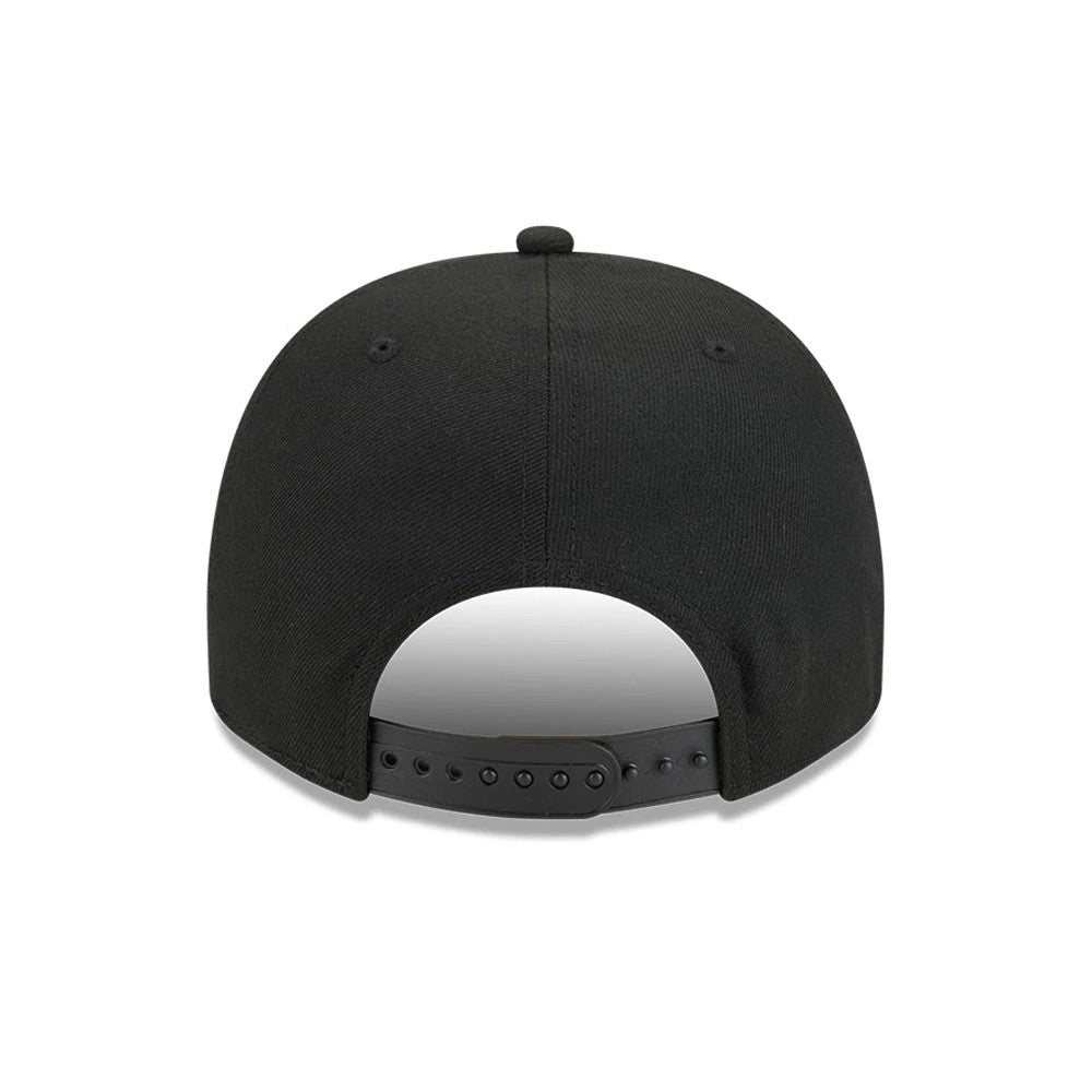 Chicago Bulls NBA Shattered Black New Era 9FORTY A-Frame Adjustable Cap, rear view showing a black adjustable strap with snaps, two embroidered black eyelets on each rear panel, and a black top button on the structured black crown.