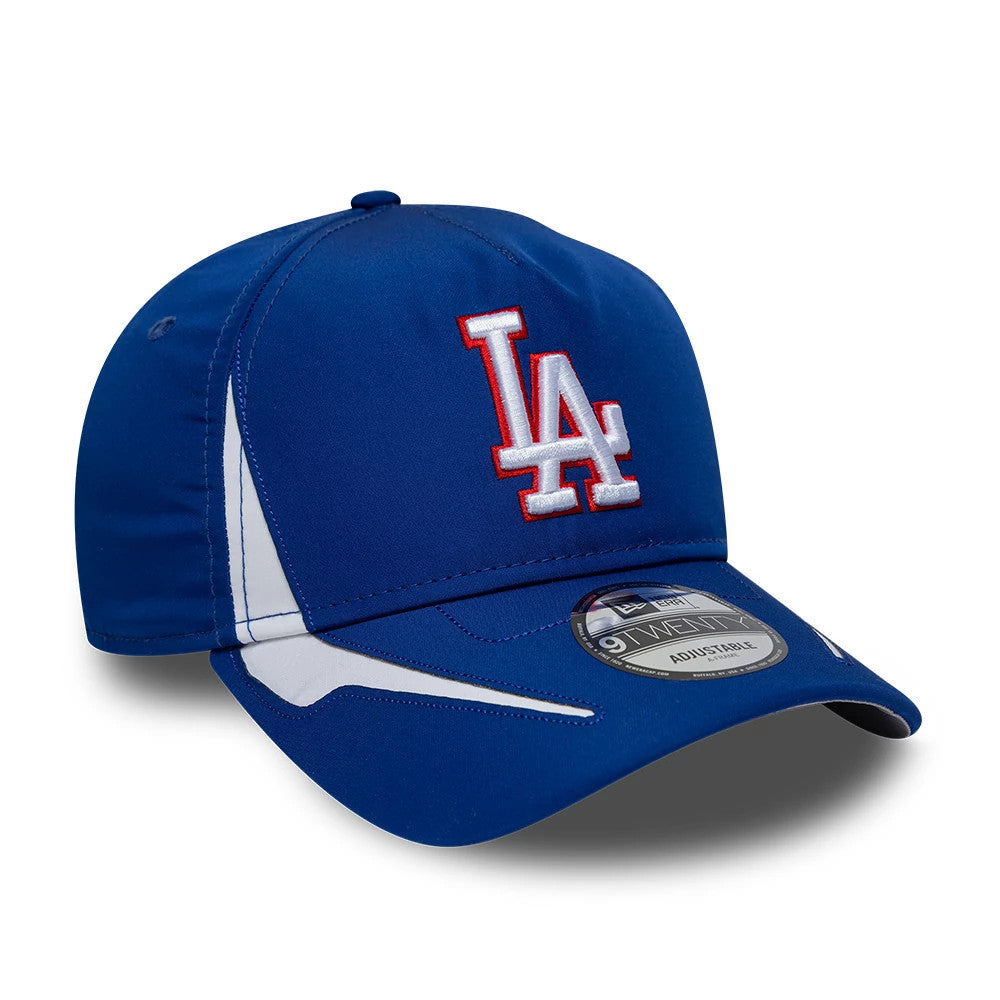 LA Dodgers MLB Panel Blue New Era 9TWENTY A-Frame Adjustable Cap, front view showing the raised embroidered white and red LA logo on the structured blue crown, with a New Era 9TWENTY size sticker on the blue curved visor and white side panel accents.