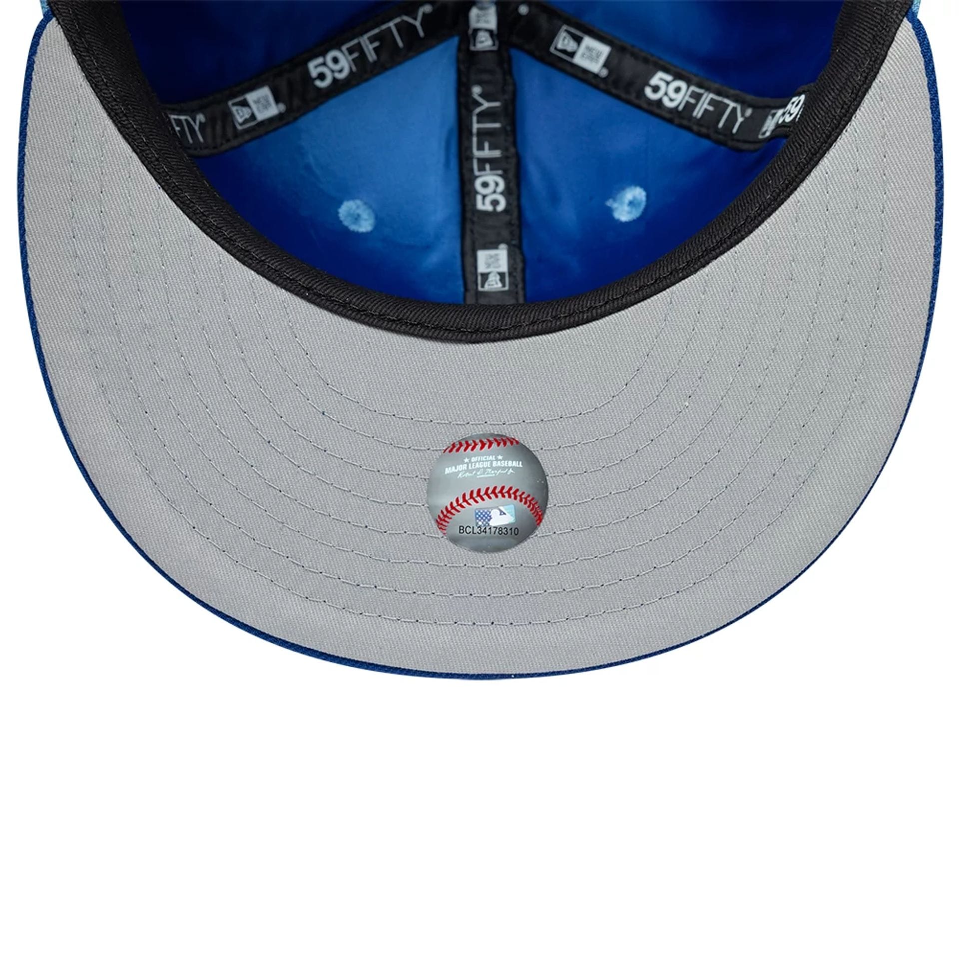 Pictured is this MLB Multi Logo Kansas City Royals 59FIFTY Fitted cap in pastel blue. 2