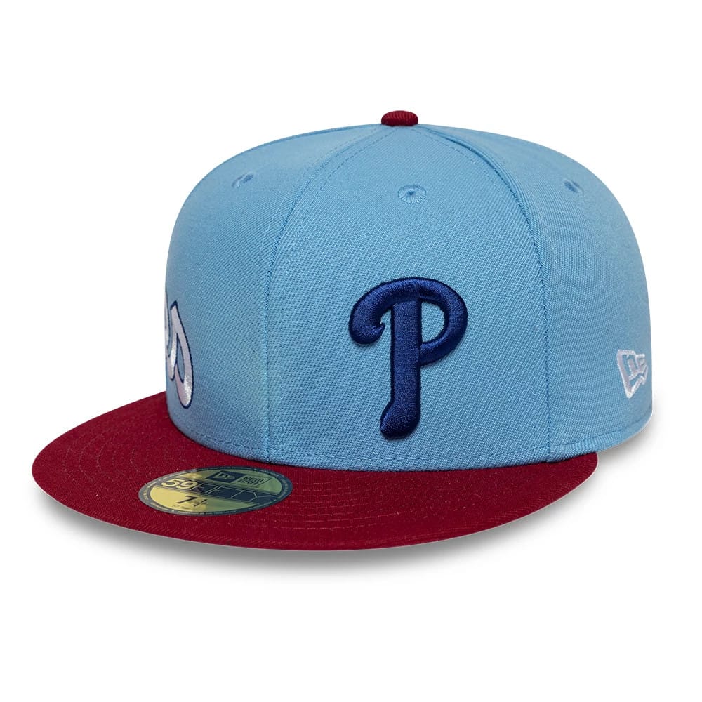 Pictured is this MLB Multi Logo Philadelphia Phillies 59FIFTY Fitted cap in pastel blue. 1