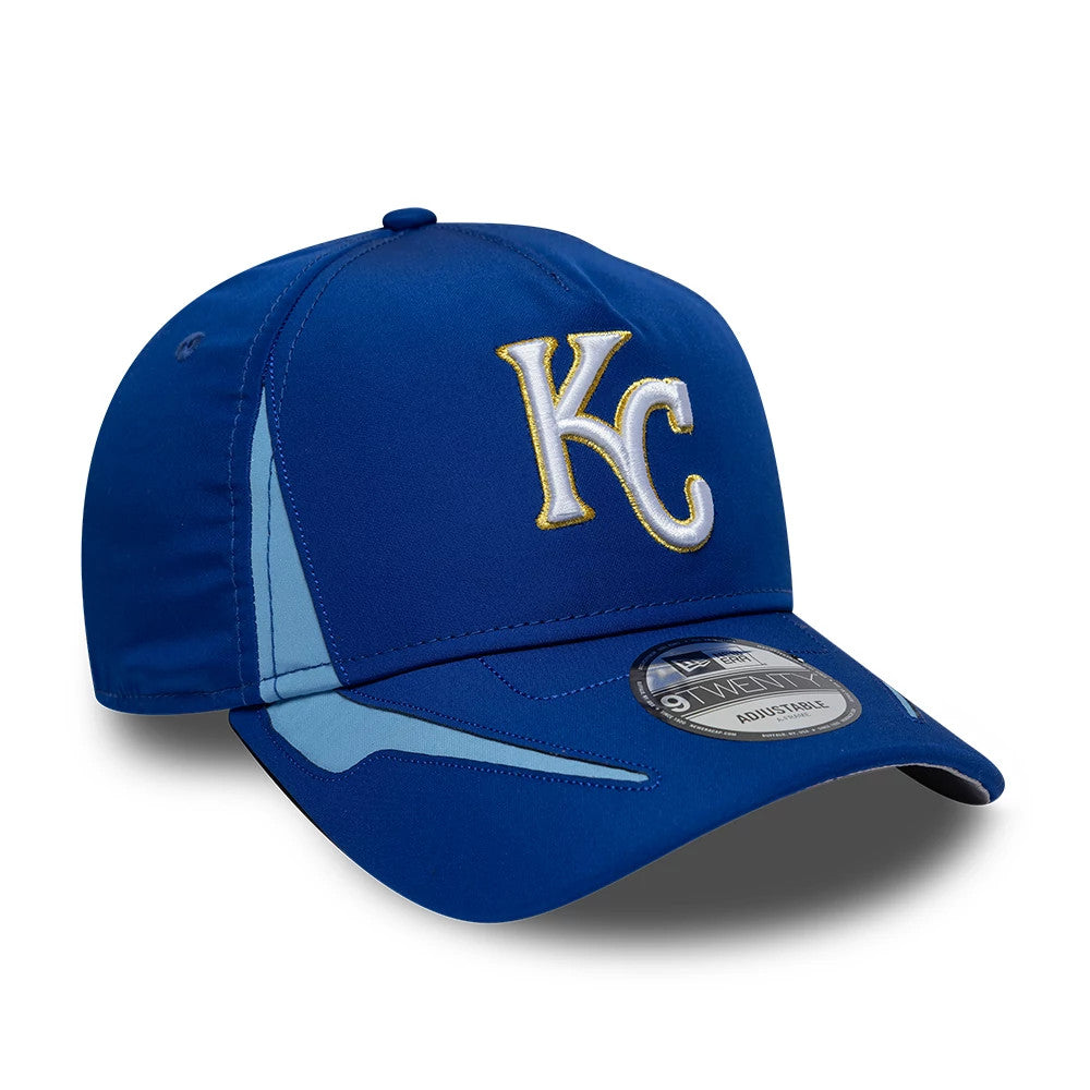 Kansas City Royals MLB Panel Blue New Era 9TWENTY A-Frame Adjustable Cap, three-quarter view showing the gold and white embroidered KC logo on the blue front panel, curved blue visor with a 9TWENTY size sticker, and light blue side panel accents.