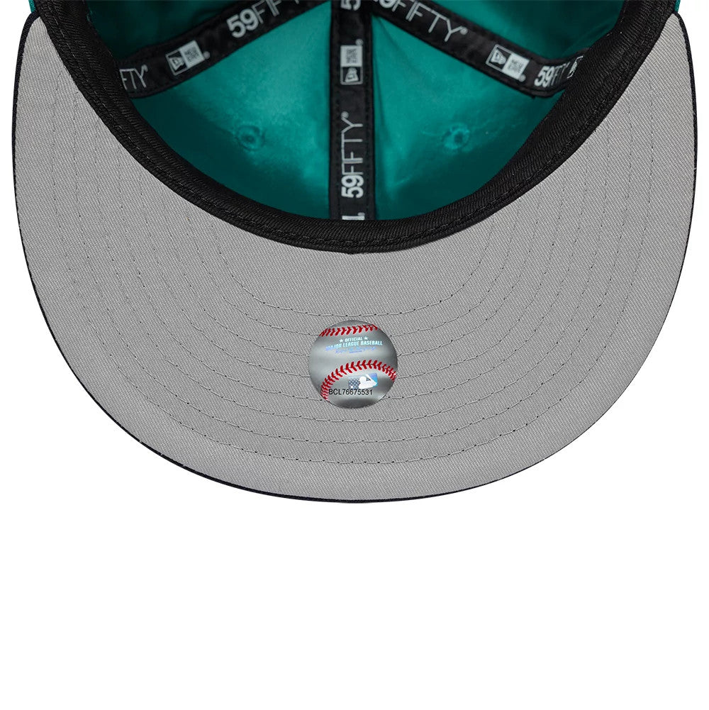 Pictured is this MLB Multi Logo Seattle Mariners 59FIFTY Fitted cap in green. 8