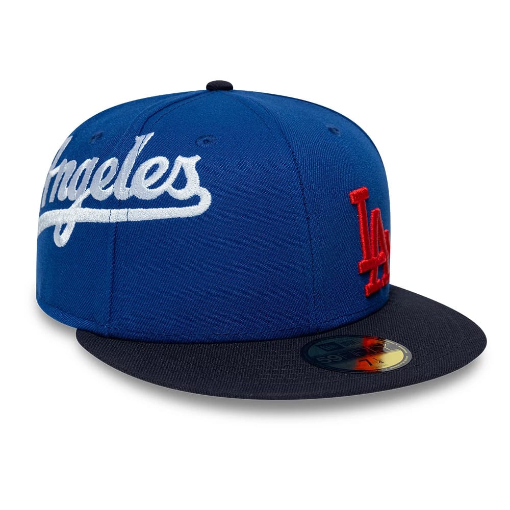 Pictured is this MLB Multi Logo LA Dodgers 59FIFTY Fitted cap in blue. 1