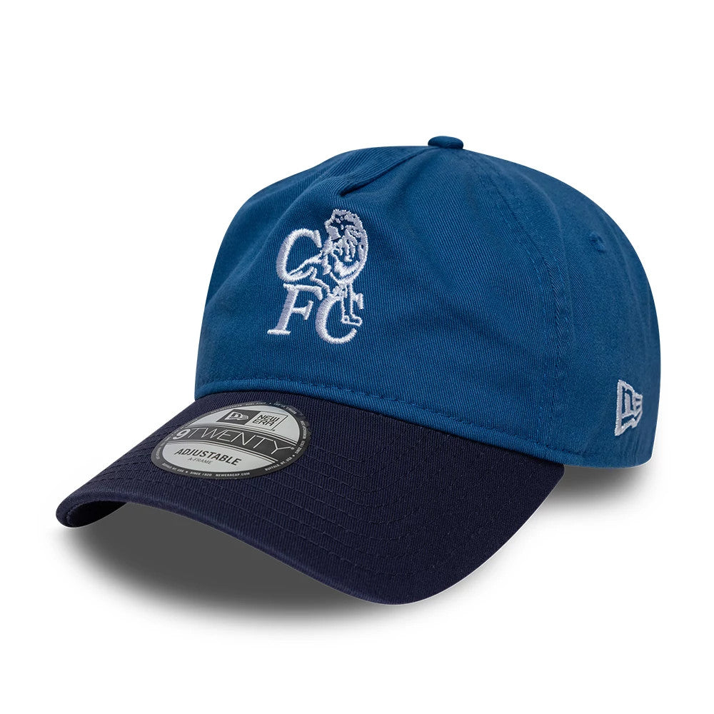 Chelsea FC Retro Goal Keeper Blue New Era 9TWENTY A-Frame Adjustable Cap, front view showing a white embroidered lion logo on the unstructured blue crown, with a contrasting navy visor and a 9TWENTY size sticker on the visor.