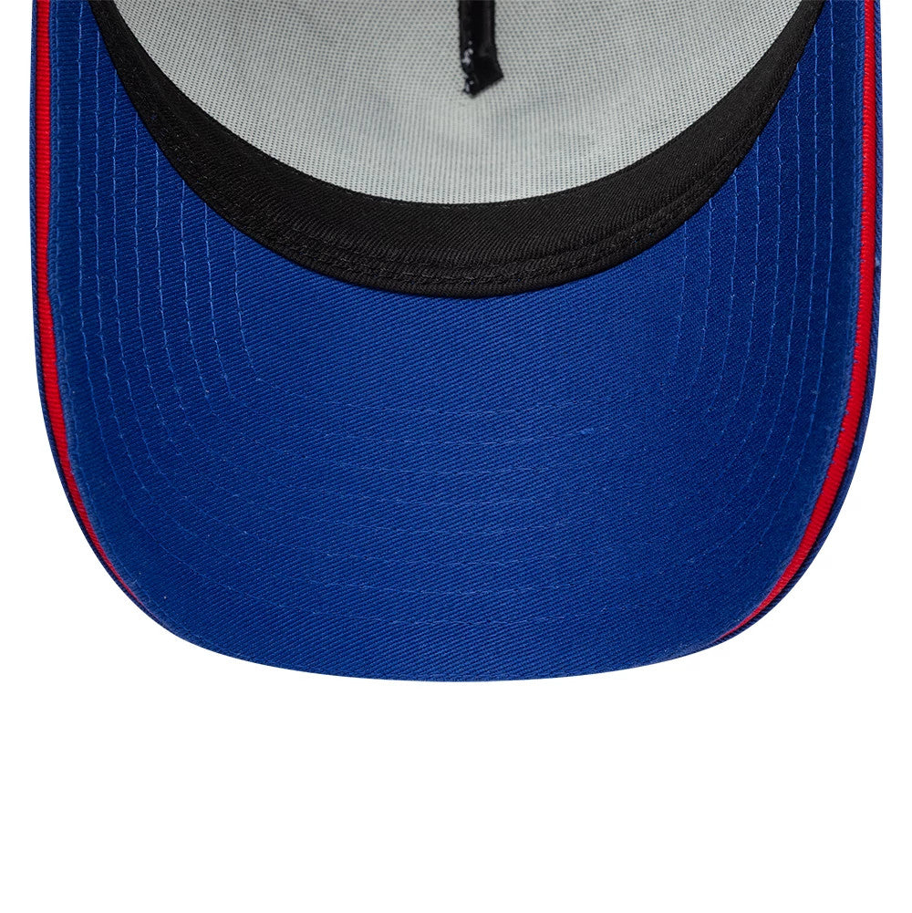 24HR Le Mans Track Blue New Era 9FORTY A-Frame Trucker Adjustable Cap, inside view showing the grey undervisor, black sweatband, and the base of the crown with red piping along the edge of the blue visor.