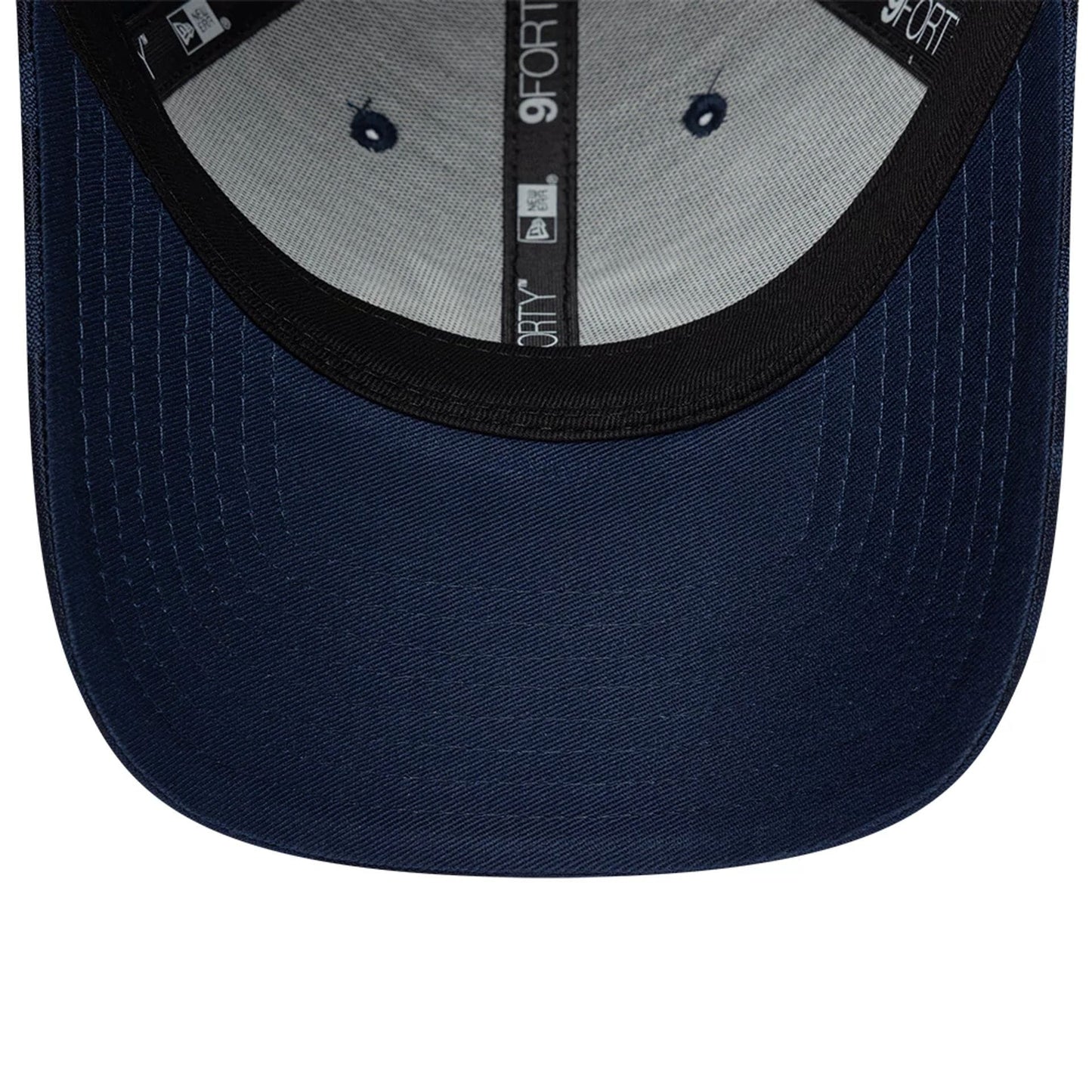 Pictured is this Camo 24HR Le Mans 9FORTY cap in dark blue. 5