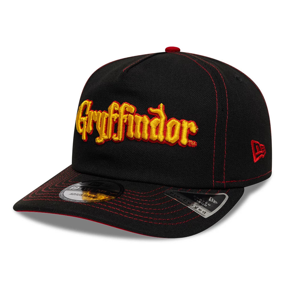 Harry Potter Gryffindor Black New Era 19TWENTY Adjustable Cap, front view showing the yellow and red raised embroidered Gryffindor script on the black front panel, contrasting red New Era flag logo on the left side.