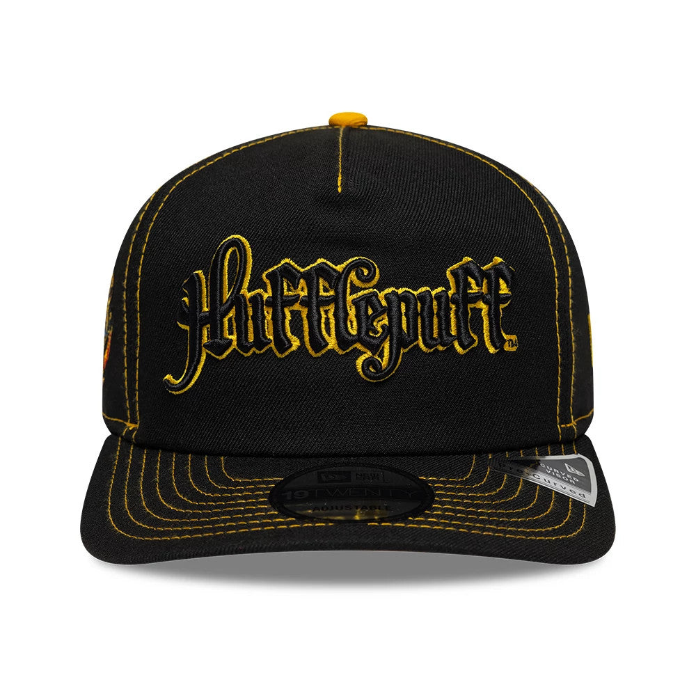 Harry Potter Hufflepuff Black New Era 19TWENTY Adjustable Cap, front view showing the Hufflepuff logo in raised yellow embroidery on the black front panel, with contrasting yellow stitching on the visor and a black 19TWENTY size sticker.