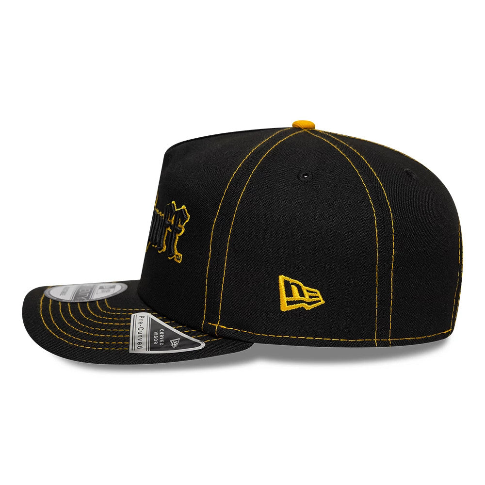 Harry Potter Hufflepuff Black New Era 19TWENTY Adjustable Cap, side view showing the gold embroidered New Era flag logo on the left side and the raised Hufflepuff logo on the front panel, with contrasting gold top button and stitching.