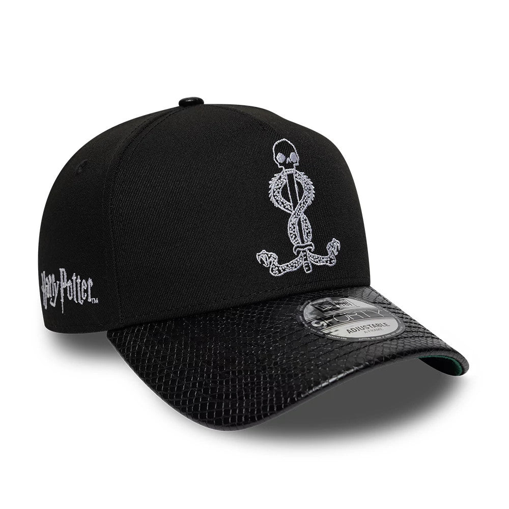 Harry Potter Slytherin Black New Era 9FORTY A-Frame Adjustable Cap, front view showing silver embroidered snake and skull logo on the black crown, black snakeskin-patterned curved visor and the 9FORTY size sticker.