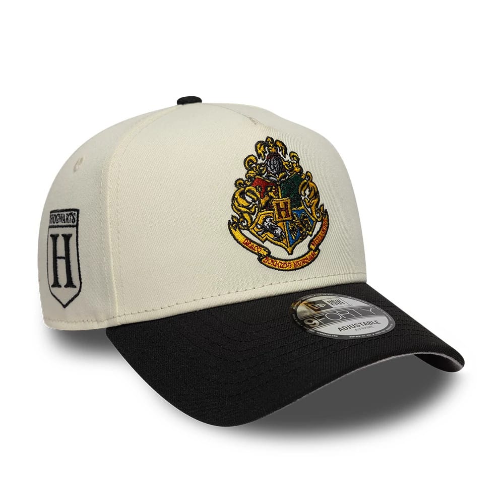 Pictured is this Harry Potter Hogwarts 9FORTY A-Frame cap in white and black. 1