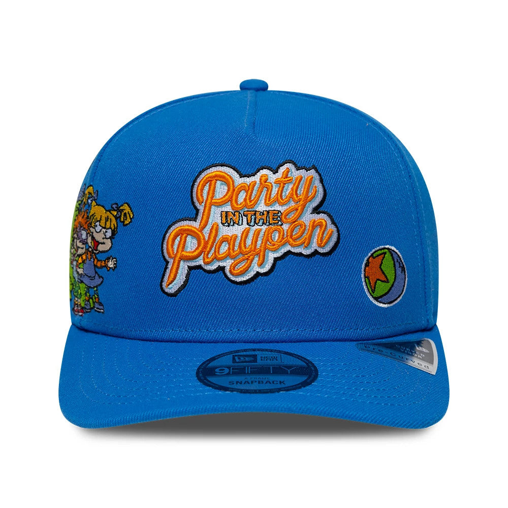 Rugrats Party In The Playpen Blue New Era 9FIFTY A-Frame Snapback Adjustable Cap, front view showing the orange and white Party In The Playpen embroidery on the blue crown, colourful character graphics on the side.