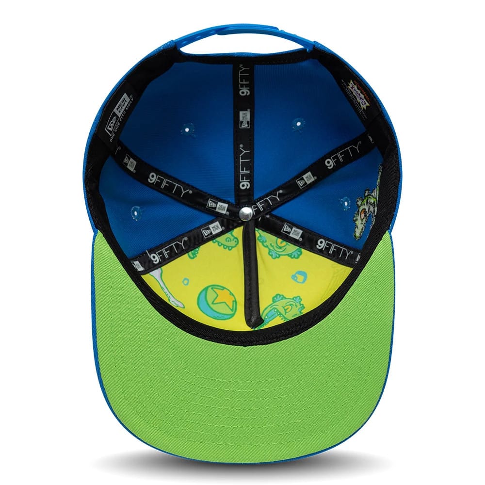Pictured is this Rugrats Party In The Playpen 9FIFTY A-Frame Snapback cap in blue. 2