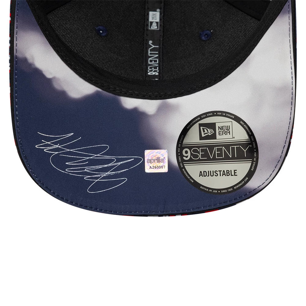 Aprilia Replica Marco Bezzecchi Silverstone Race Special Blue New Era 9SEVENTY Stretch Snap Adjustable Cap, inside view showing the printed clouds on the blue undervisor, 9SEVENTY size sticker.